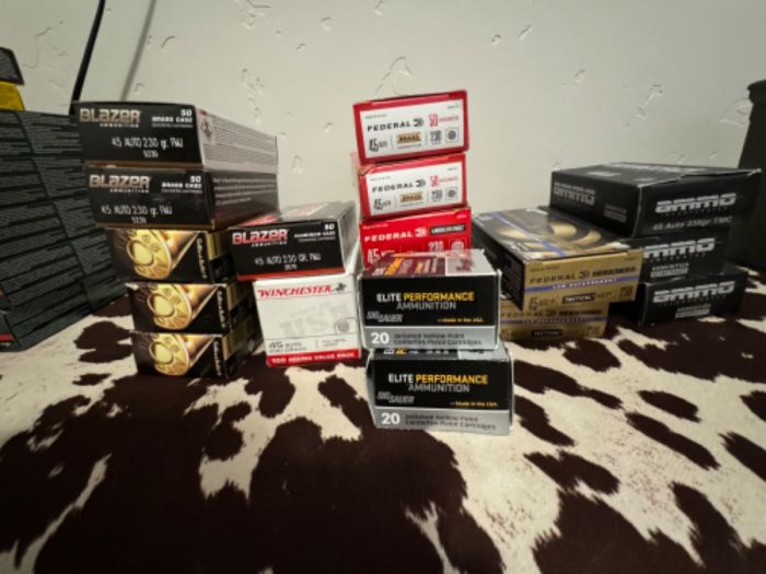 NEW .45ACP ammo in boxes, stored in safe