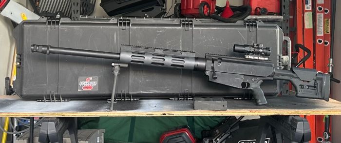 Bushmaster 50 cal rifle 