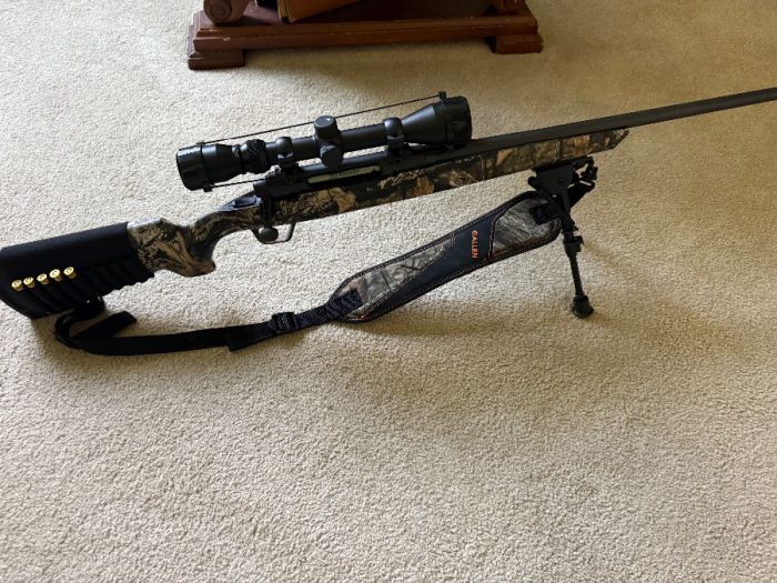 Savage 308 with scope and tripod