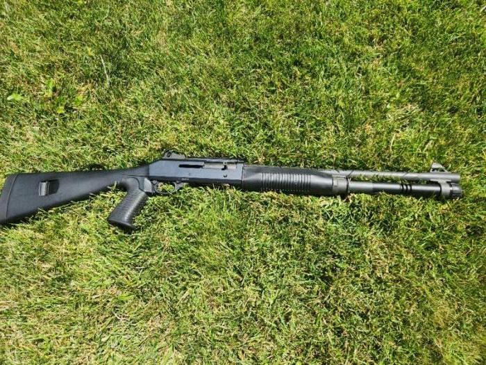 Benelli M4 with accesories.