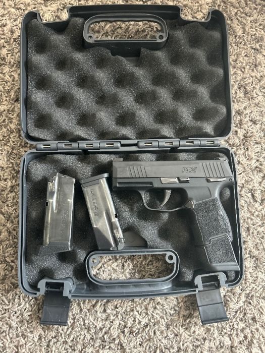 Sig Sauer P365 with manual safety. 3 mags.