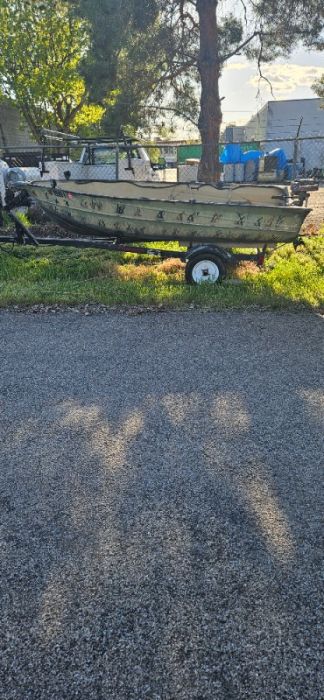 12 foot camo boat with 3 hp motor